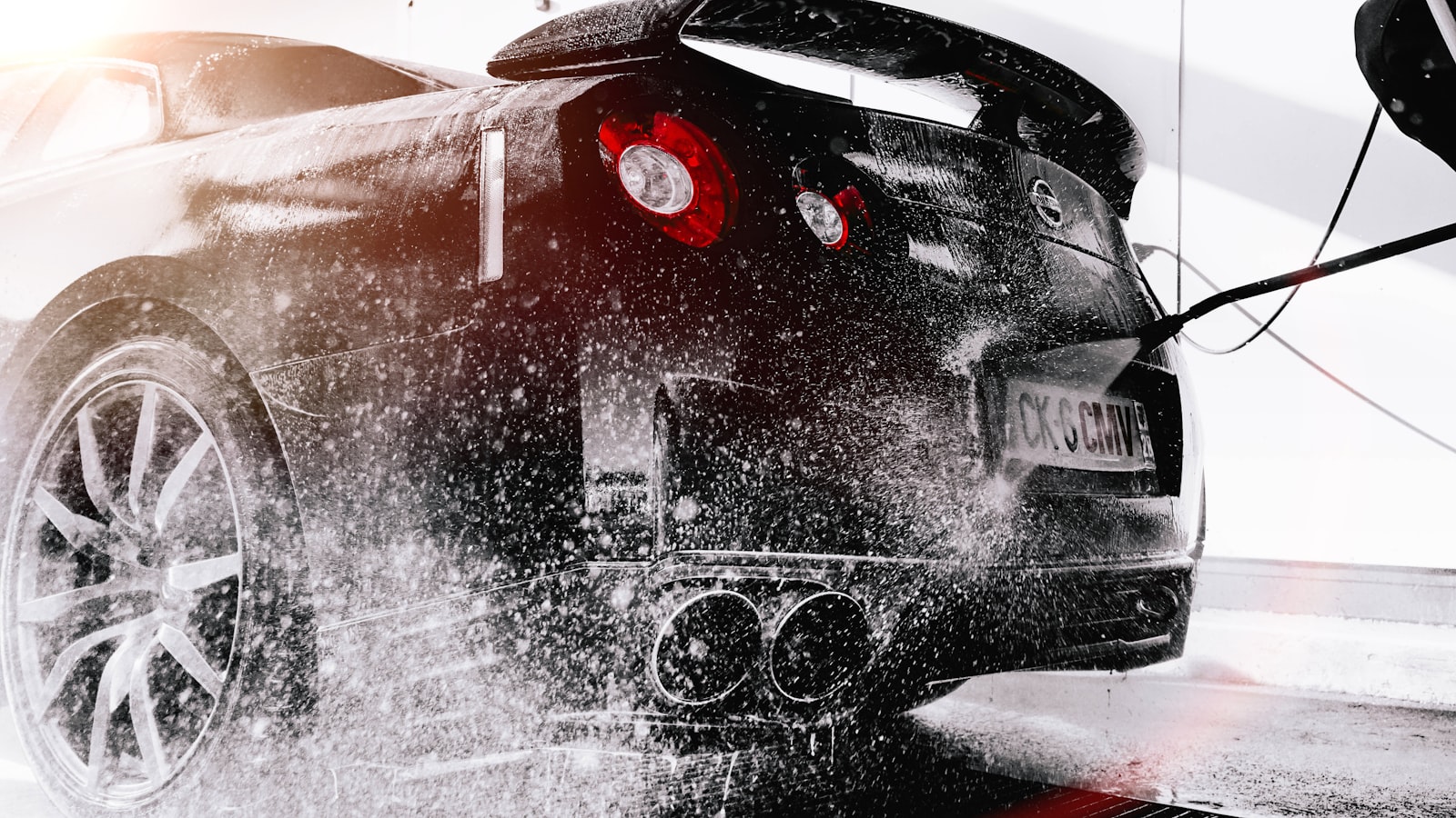 Water sheeting off ceramic-coated black paint